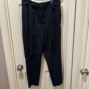 Black fancy work pants with tie in front. Size 8. Stretchy